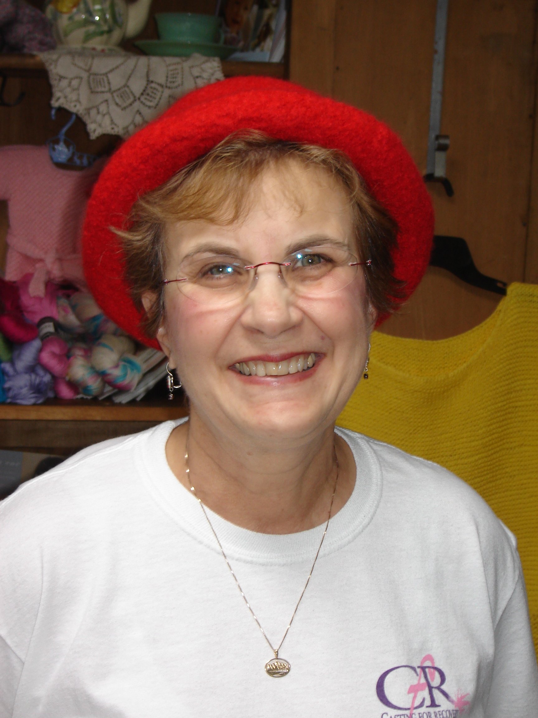 Penny wearing red hat